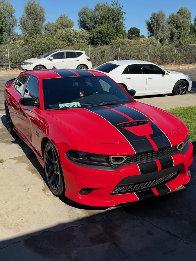 Red Dodge Charger after a full exterior detail in Tulare, CA