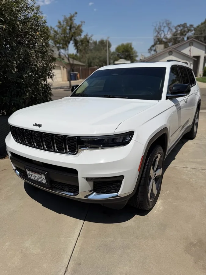 White Jeep Grand Cherokee washed and detailed in Tulare, CA