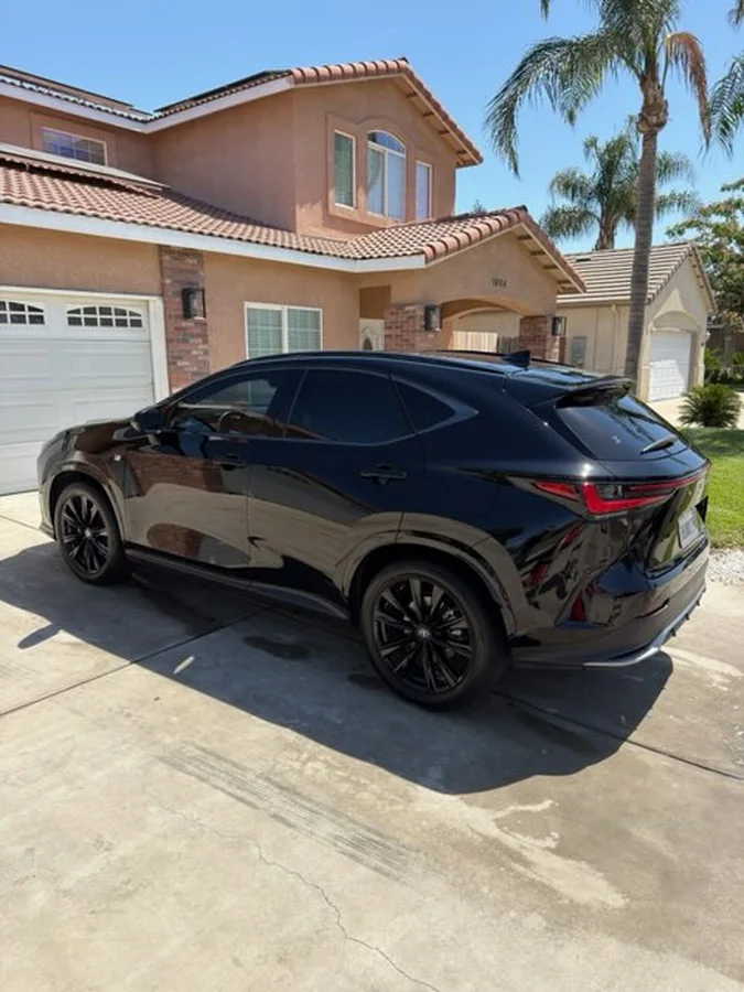 Black Lexus SUV detailed in a driveway in Tulare, CA